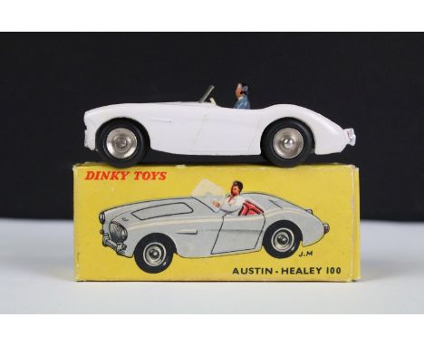 Boxed French Dinky 546 Austin Healey 100 diecast model in white with red interior, driver and windscreen and concave hubs, di