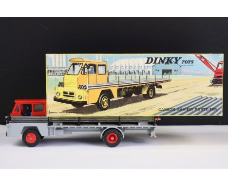 Boxed French Dinky 885 Camion Saviem Steel carrier diecast model with red cab, grey chassis and red convex hubs with blue dri