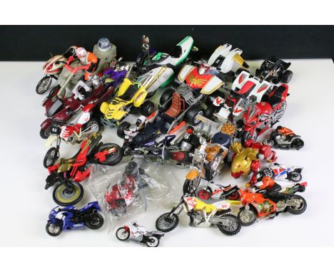 Group of various plastic model motorcycles and quad bikes of various scales 