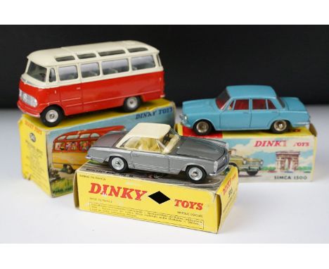 Three boxed French Dinky diecast models to include 541 in two-tone pale cream and red body with grey interior, silver trims a