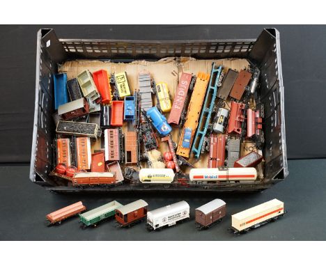 Over 50 OO gauge items of rolling stock to include Hornby, Lima, Mainline etc, features wagons, vans and tankers 