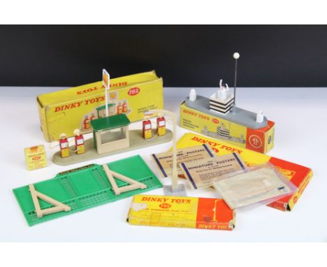 Five boxed Dinky accessories to include 753 Police Controlled Crossing, 755 Lamp Standard Single Arm, 765 Road Hoarding, 782 
