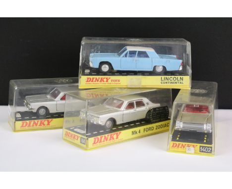 Four cased Dinky diecast models to include 2 x 164 Mk 4 Ford Zodiac in metallic grey with red interiors, silver trims and sil