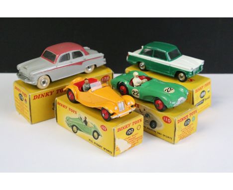 Four boxed Dinky diecast models to include 102 MG Midget Sports Car in yellow with red interior, red convex hubs and figure d