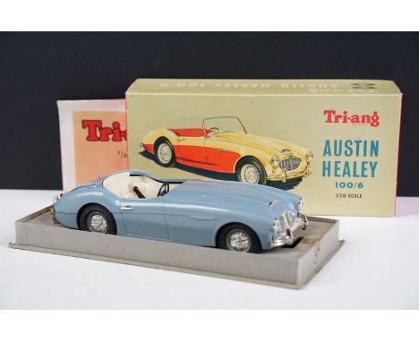 Boxed Triang Minic 1/20 Scale Electric Austin Healey 100/6 model in light blue with creamy white interior and chrome spun hub