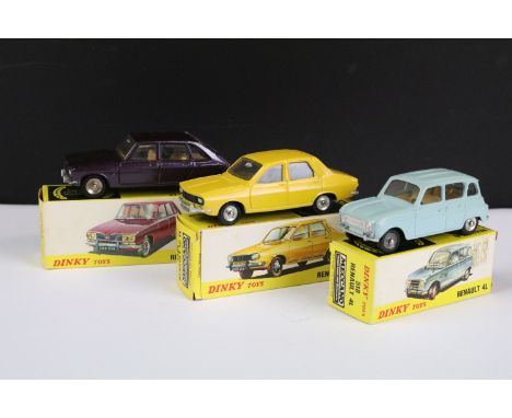 Three boxed French Dinky diecast models to include 518 Renault 4L in pale blue with tan interior, silver trims and concave si