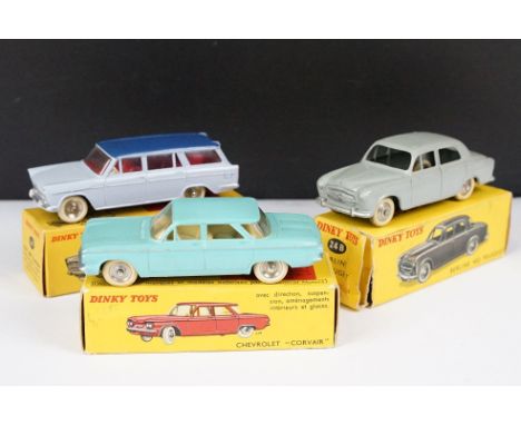 Three boxed French Dinky diecast models to include 548 Fiat 1800 Familiale in two tone blue, 24B Berline 403 Peugeot in grey 