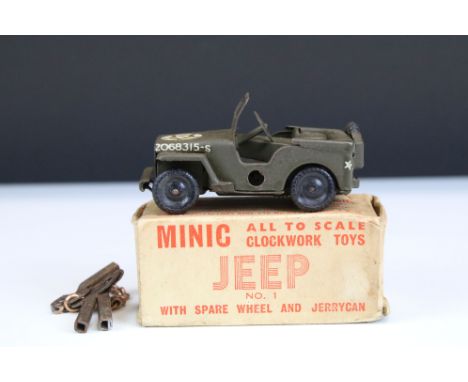 Boxed Triang Minic No.1 Series tinplate Jeep in military green, model in vg condition with slight bend to windscreen, box gd-