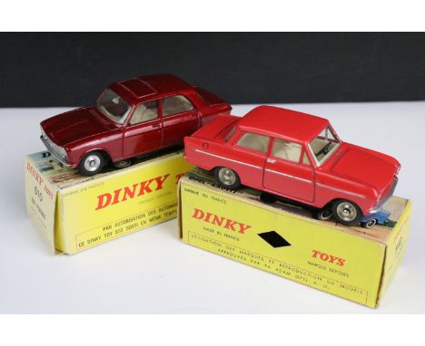 Two boxed French Dinky diecast models to include 510 204 Peugeot in metallic red with creamy white interior, silver trims and