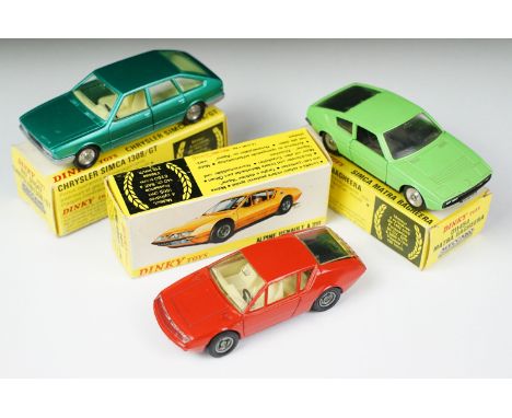 Three boxed French Dinky diecast models to include 1411 Alpine Renault A310 in red with creamy white interior, 011542 Chrysle