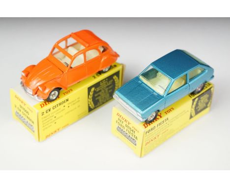 Two boxed French Dinky diecast models to include 011500 2CV Citroen in orange with white interior and silver trims and concav