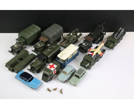 12 Mid 20th C French Dinky diecast models to include military models featuring 2 x 809 GMC Covered Wagon, 2 x 620 Berliet Mis