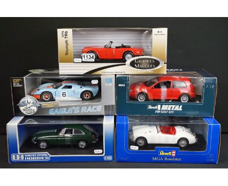 Five boxed 1/18 scale diecast models to include Universal Hobbies MGB GT Mk I in racing green, 2 x Revell models featuring 08