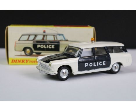 Boxed French Dinky 1429 Break Peugeot 404 Police Car diecast model with light to top, complete with sign and base and unused 