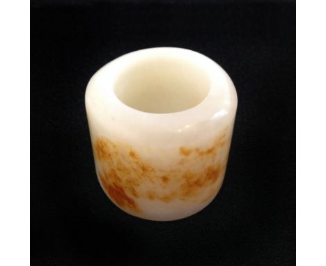 A White Jade Ring 18/19th Century. 10cm