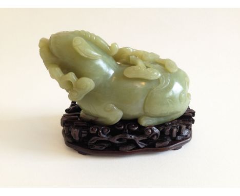 A Yellow Jade 'Mythical Beast' Pendant 19th Century. 14cm L
