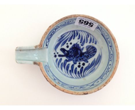 A very interesting and rare blue-white pouring bowl of the Yuan Dynasty. Delightful pattern showing fish portrait. 13cm Dia