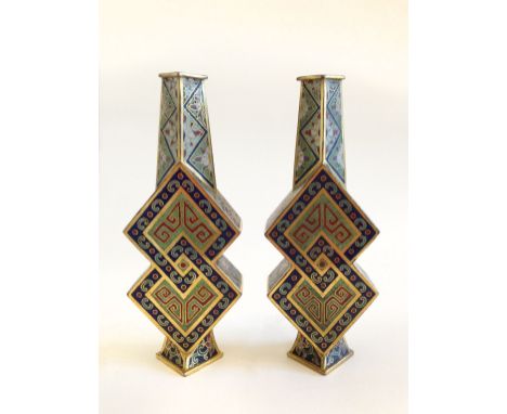 An outstanding example of 18th century of the Qinglong mark of the period. A pair of Cloisonne enamel vases, spectacular desi