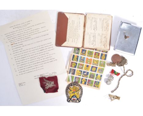 A collection of assorted WWII Second World War and related militaria items, to include; an original Airborne ' Pegasus ' clot