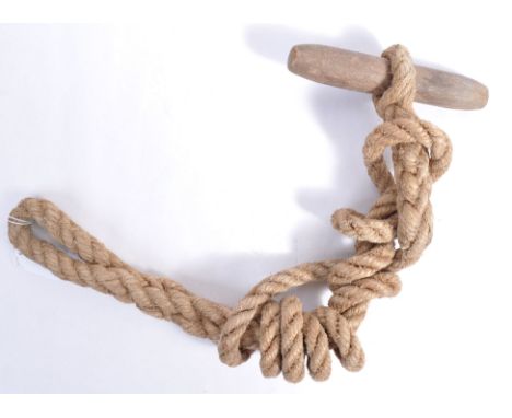 An original WWII Second World War British Army Airborne / Paratroopers jump-rope / toggle. Usual form, rope with a wooden tog