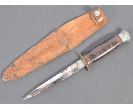 An unusual WWII Second World War era double-edged Sheffield made combat dagger, possibly fashioned from two knives. The blade