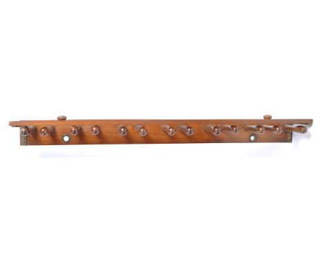 A WWI First World War officers folding / campaign belt / coat or gun rack. Mahogany construction, with brass hinges fitted, a