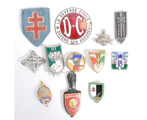 An interesting collection of x12 WWII Second World War and related badges and patches. To include; an original ' Free French 