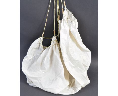 An original 20th century c1960's (1967 dated) British Army silk supply parachute. Usual form - off-white silk parachute with 