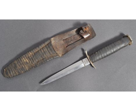 A rare WWII Second World War Clements of Sheffield made commando fighting dagger. The ricasso stamped with makers marks, and 