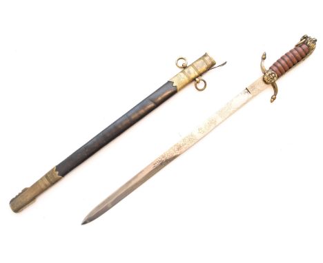 A WWI First World War British Navy Midshipman's Naval dirk having a leather and wire bound hilt with lion head pommel and lio