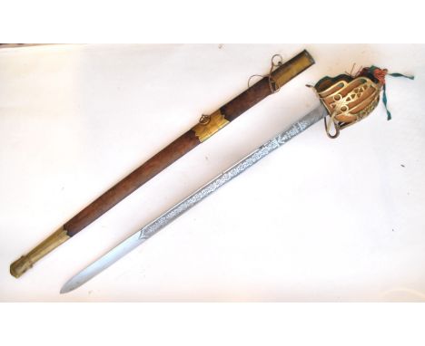 A replica reenactment British ( Scottish Highland Regiment ) 1860 pattern officers broadsword having a leather and wire wrapp