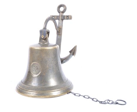 A replica 1842 cast metal ships bell having a cast wall mounting anchor bracket supporting a bell with clapper. The bell havi