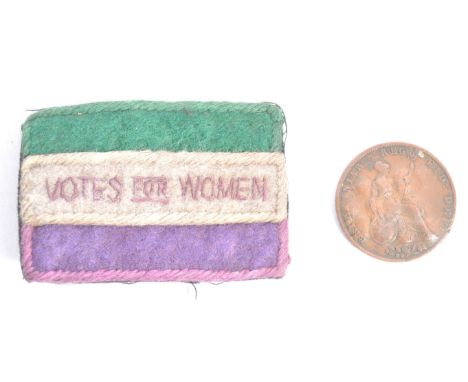 A rare Edwardian Suffragette ' Votes For Women ' cloth clothing patch. Rectangular in shape, with ' Votes For Women ' notatio