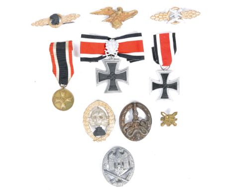 A collection of x10 replica WWII Second World War Third Reich Nazi German Army badges and medals, to include; Iron Cross, Gen