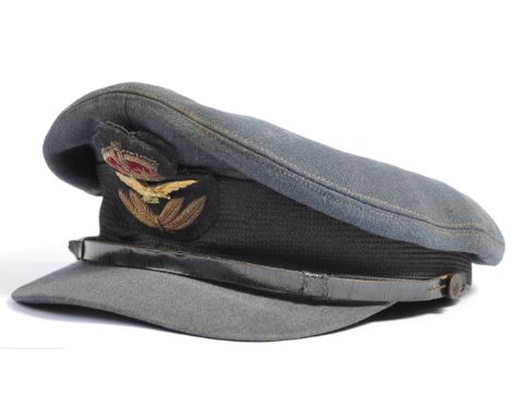 An original WWII Second World War Pilot Officer's uniform peaked cap. Belonging to Pilot Officer 41677 Clifford Herbert Deard