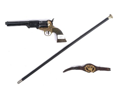 A collection of assorted militaria to include a replica Colt 45 revolver, a Class 2 Warrant Officer leather arm band and a mi