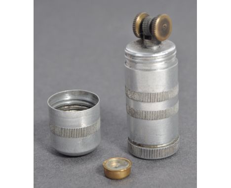 An original WWII Second World War RAF Royal Air Force miniature cigarette lighter, with hidden compass to base. The lighter b