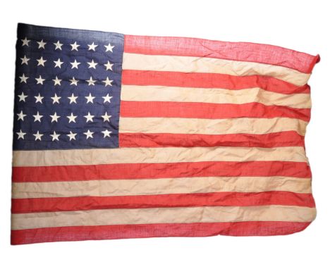 A rare WWII Second World War dated US Army American flag. Linen construction, single panel, with 48 stars. The seam dated 194