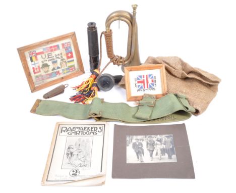 A collection of assorted military related items - largely WWII Second World War related, to include; a vintage brass and copp