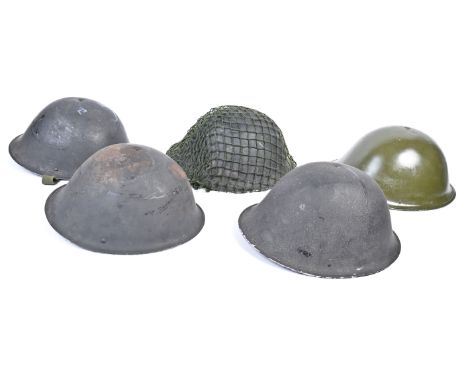 A collection of x5 WWII Second World War pattern British Army steel ' Turtle ' helmets. All generally in good physical used c