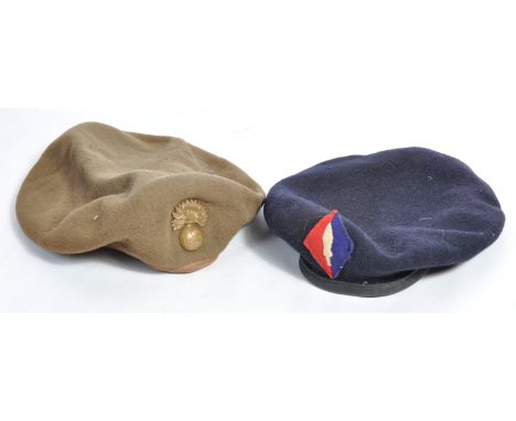 Two original WWII Second World War era British Army uniform berets, with badges. The first being a Fusiliers beret (undated),