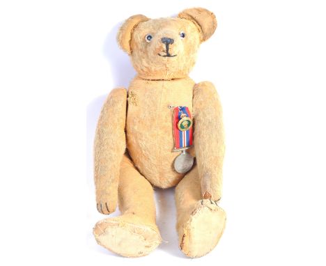 A charming antique 1920's / 1930's British made large jointed teddy bear, as owned by a Mrs Peggy Watson. ' Ted ' stayed with