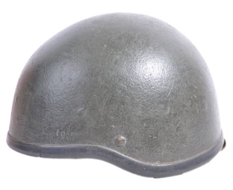 An original vintage 1970's Israel / Israeli Special Forces military combat helmet. Makers label for Rabintex ' Infantry Helme