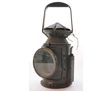 A WWII Second World War British hand held railway signal lamp by Harry J Pratt and Co Birmingham dated 1945 and stamped with 