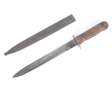 An unusual WWII Second World War era adapted fighting knife having a carved diagonal ribbed wooden handle, guard, shortened d