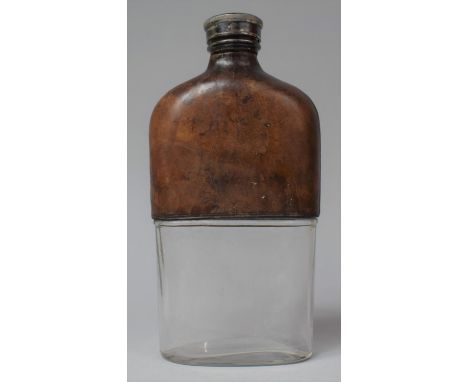 An Edwardian Leather Mounted Glass Hip Flask of Large Size with Silver Plated Screw Top, 21.5cm high 