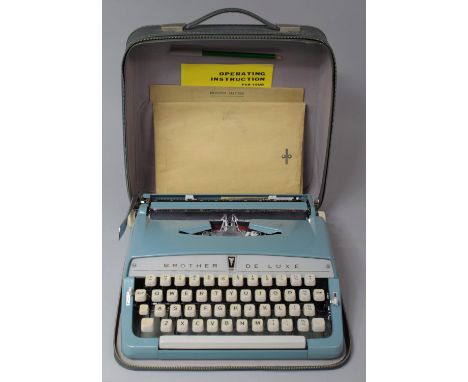 A Vintage Cased Brother Deluxe Manual Portable Typewriter 