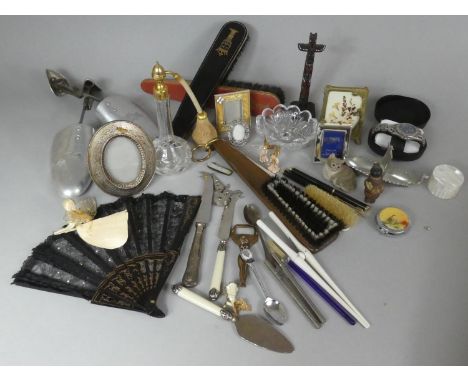 A Box of Curios to Include Glass Perfume Atomiser, Indian Souvenir, Easel Photo Frames, Wrist Watch, Fans etc 