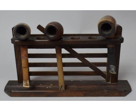 A Novelty Treen Pipe Rack in the Form of a Five Bar Gate, 29cm Wide, Complete with Three Vintage Pipes 