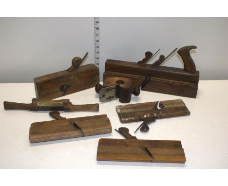 A selection of vintage wood working moulding planes etc 